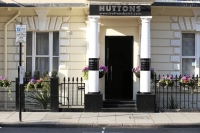  Vacation Hub International | Huttons Hotel Lobby