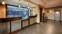  Vacation Hub International | Best Western Plus Suites Downtown Calgary Lobby