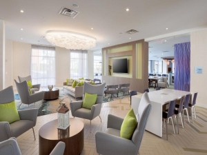  Vacation Hub International | Holiday Inn Express & Suites - Orlando At Seaworld, an IHG Lobby