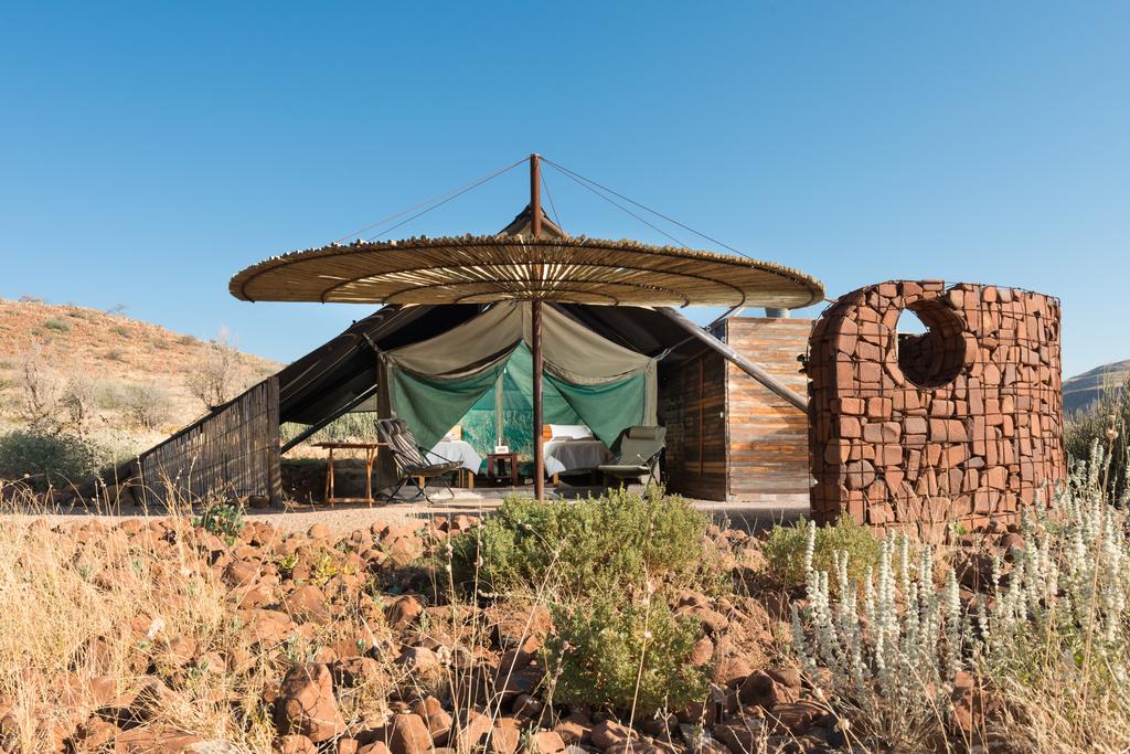 Vacation Hub International - VHI - Travel Club - Etendeka Mountain Camp