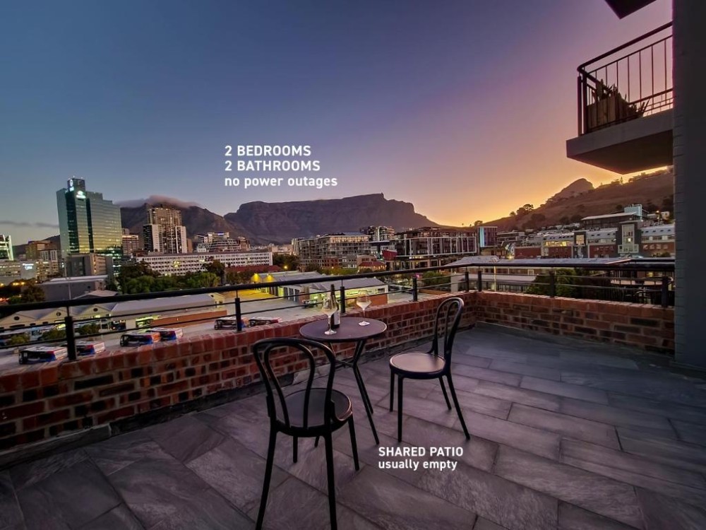 Vacation Hub International - VHI - Travel Club - Chic, Easy De Waterkant with mountain views! No power outag