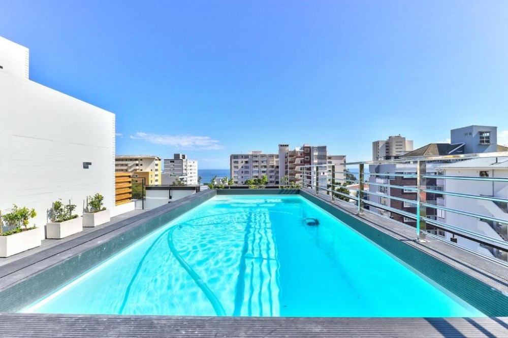 Vacation Hub International - VHI - Travel Club - Stylish, brand new, secure apartment with pool