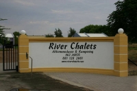  Vacation Hub International | River Chalets Main