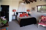  Vacation Hub International | Blue Tangerine Luxury Guest House Room