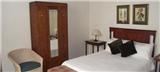  Vacation Hub International | The Caledonia Guest House Room