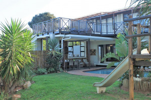  Vacation Hub International | The Sea Gem Beach House Room