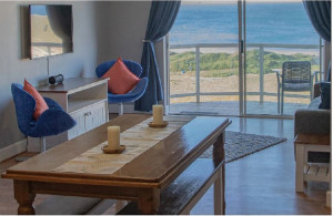  Vacation Hub International | AquaBliss Beachfront Apartment Room